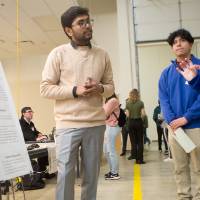 high school students interacting with a presenter on ct scans